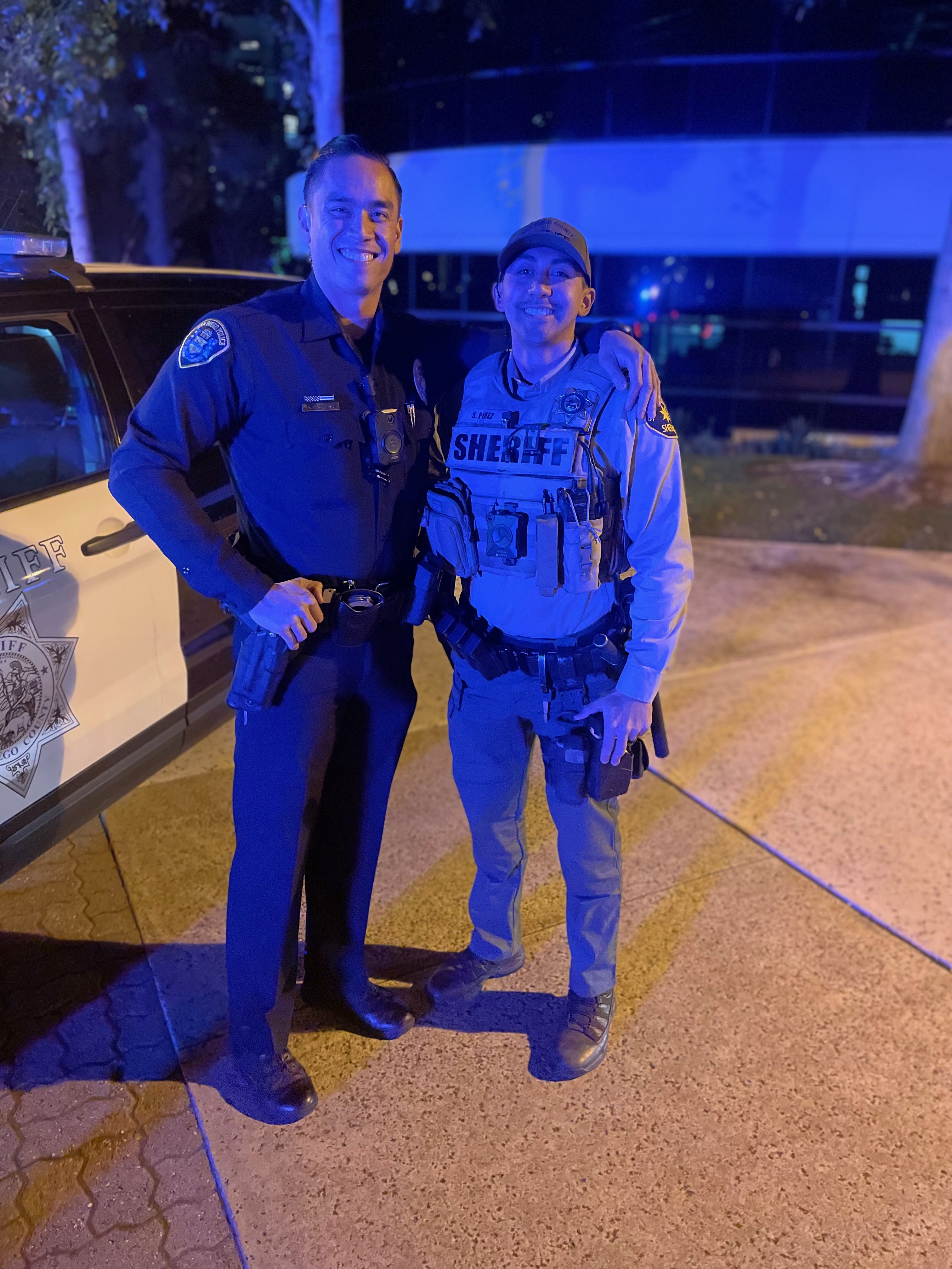 Austin in uniform with a fellow officer
